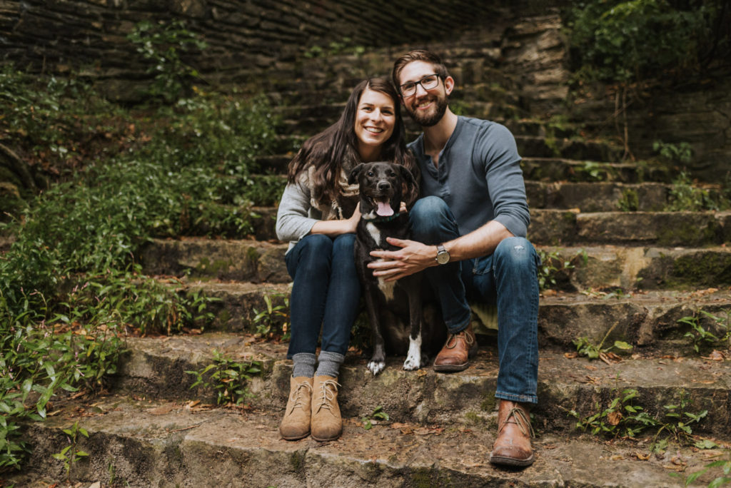 portrait of couple in nature with dog