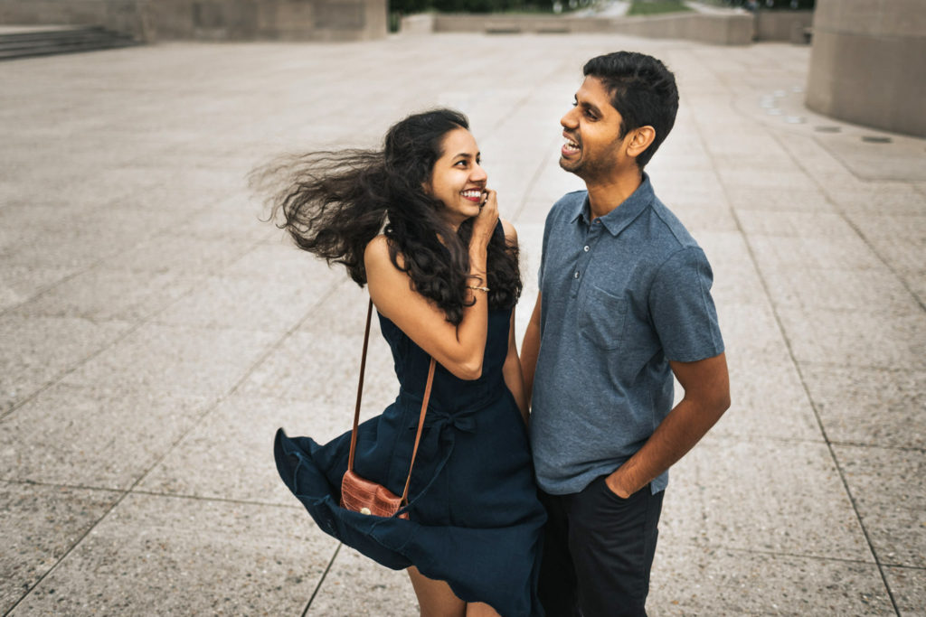 couple celebrating anniversary in kansas city on windy day